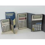 Three vintage c1970s pocket calculators,