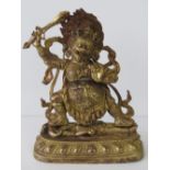 A late 19th century Tibetan gilt bronze