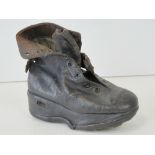 A delightful Victorian cobbler made leather single childs boot (right foot) with raised sole and