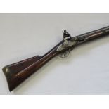 An original early 18th century flintlock rifle, London made and bearing crown mark to side action,