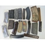 A quantity of assorted assault rifle magazines including M16, AK74 etc. Eighteen items.