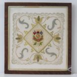 A framed WWI British embroidery for The South Wales Border Regiment, within oak frame,