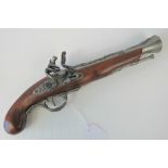 A 20th century copy of an 18th century blunderbuss flintlock pistol, working movement, walnut stock,