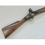 An original early 18th century flintlock rifle, bearing lion ardent and crown mark to side action,