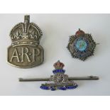 Two WWII silver sweetheart badges, one for Royal Artillery stamped Sterling,