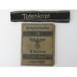 A WWII German SS Panzer Grenadeir Totenkopf pass book complete with photo,