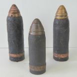Three WWi British shell leads and fuses, one made by BMC from an 18lb shell.