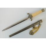 A reproduction WWII German Officers dagger, stamped 'FW Holler Berlin' to 24cm blade,