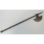 A reproduction battle axe with spike top and metal handle, 57cm in length.