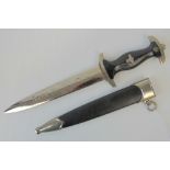 A reproduction WWII SS dagger, engraved blade 21.