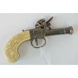 A 20th century copy of an 18th century flintlock pistol, faux ivory grip,