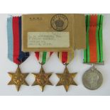 A WWII British medal set within cardboard box addressed to R.R.