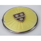 A white metal and engine turned guilloche enamel compact bearing the coat of arms for Emmy Goring