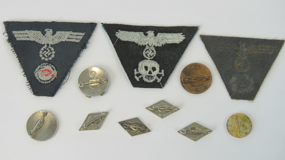 A quantity of reproduction WWII cloth and metal badges. 11 in total. - Image 2 of 2