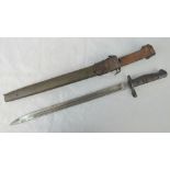 A WWI bayonet, blade stamped Remington 1918 with US inspection mark verso,