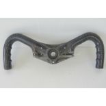 A twin handled cast aluminium steering boss from WWII aeronautical joystick. 38 cm wide.