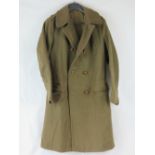 A green Officers Great Coat, complete with buttons and in good condition.