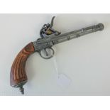 A 20th century copy of an 18th century flintlock pistol, stamped London to movement,