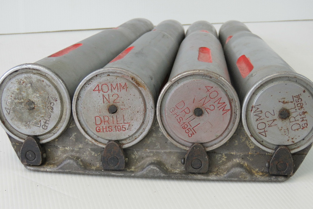 Four inert 40 mm drill rounds on clip, length approx 45 cm. - Image 2 of 2