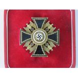 A German Order Cross, yellow metal with