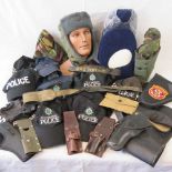 A selection of police hats and gun acces