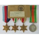 A WWII British medal set within cardboar