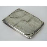 A HM silver vesta matchbook case with gilded interior, hallmarked Birmingham 1924, 6.2 x 4 cm, 1ozt.