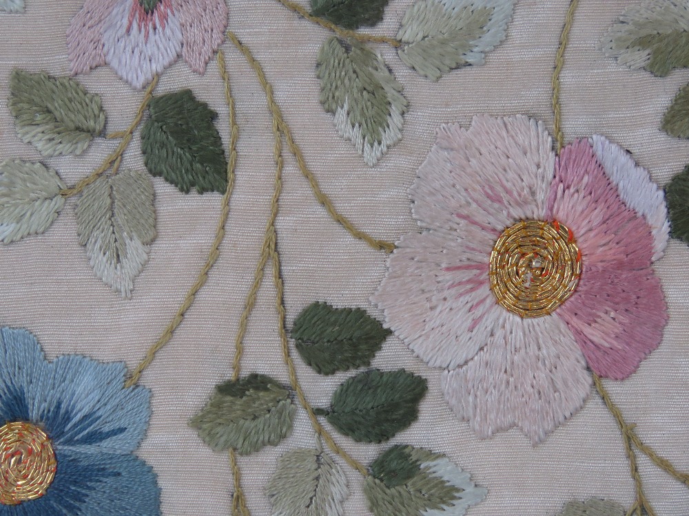 A delightful late 19th century hand embroidered floral panel depicting flowers and leaves in blues - Image 2 of 2