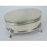 A HM silver jewellery casket, lid lifting to reveal original silk lined compartment within,