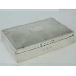 Garrard & Co; a HM silver cigar box,