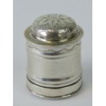 A late 18th/early 19th century white metal nutmeg grater with floral engraving,