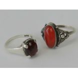 A HM silver ring set with oval garnet ca