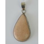 A teardrop shaped pink agate necklace, s