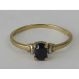 A 9ct gold ring with claw set oval cut s