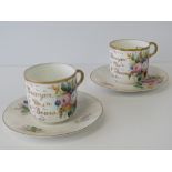 A pair of Royal Doulton cups and saucers