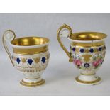 A pair of French style porcelain cups be