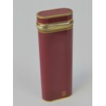 A Swiss made Must de Cartier lighter, re