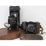 A Zeiss Ikon folding Telmar bellows camera having Novar anastigmat 7.5cm 1.