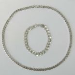 A heavy silver curb link mens necklace and bracelet set, each stamped 925, bracelet 20.