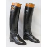 A fine pair of black leather riding boots,