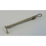 A Stirling silver stock pin or brooch in the form of a riding crop, stamped Stirling, 4.5cm long.