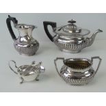 A three piece silver plated tea set comprising: tea pot, milk jug and sugar bowl.