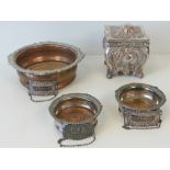 A pair of silver plated wine coasters together with a large crested wine coaster (plating a/f).