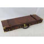 A superb brown leather 12 bore two gun case,