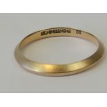 A 9ct rose gold band, hallmarked Birmingham 375, size M,1.6g.