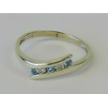 A 9ct white gold diamond and aquamarine ring,