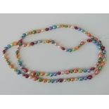 A long mixed circle and semi-baroque pearl necklace, a multitude of colours and sizes,