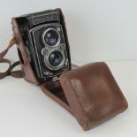 A late 1950s Rolleiflex Syncro-Compur marked Frakne Hidecke under with Heidosmat 1:2,