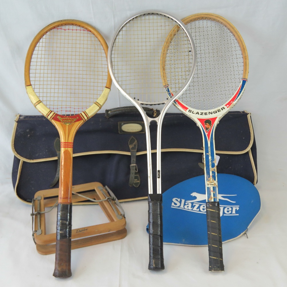 A vintage Slazenger tennis racket bag complete with wooden Slazenger 'Manuel Orantes' racket,