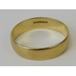 A 9ct gold band, hallmarked 375, size S-T, 2.4g.